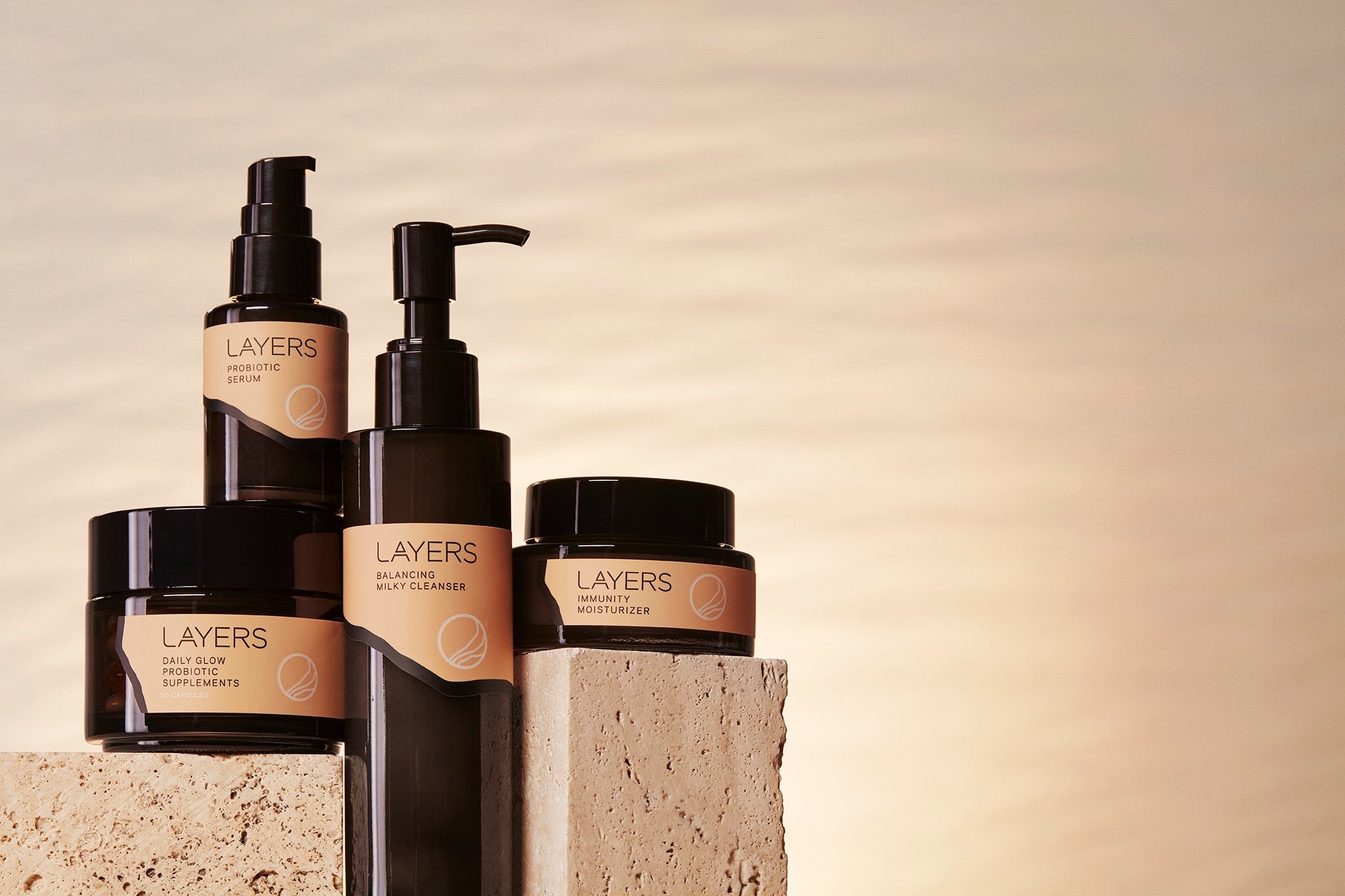 Layers Probiotic Skincare Group Product Shot with Glass Packaging and Labels. For dry skin, oily skin, combination skin. 