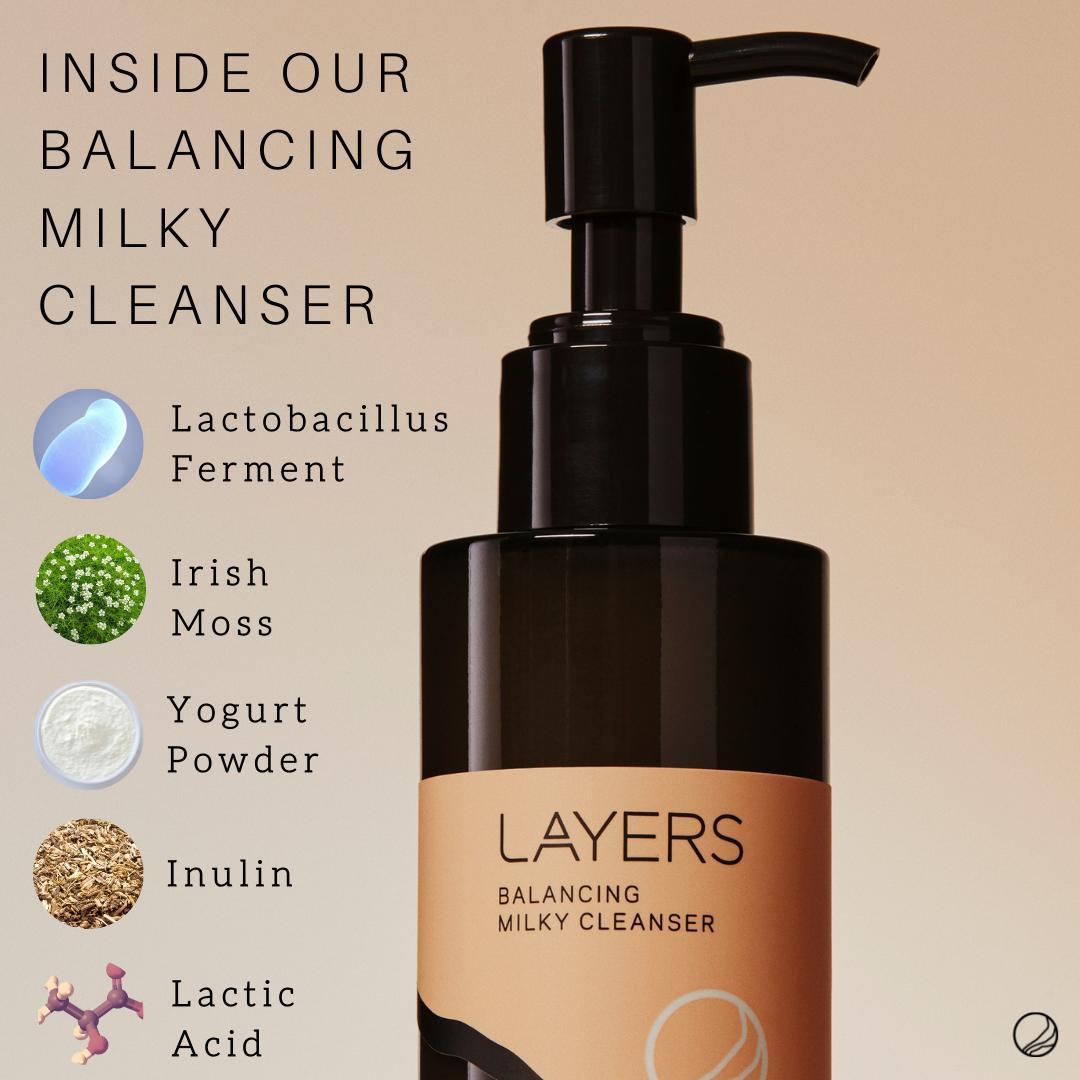 Layers Probiotic Skincare Balancing Milky Cleanser in semi-transparent black glass bottle with ingredients listed. Ingredients: Probiotics, Irish Moss, Yogurt Powder, Inulin, Lactic Acid.